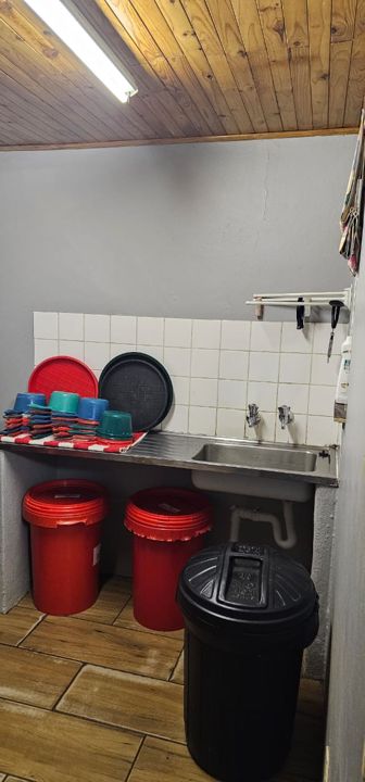 The sink, feed bins and bowls in the Rottweilers' kitchen at Craffenheim Rottweilers